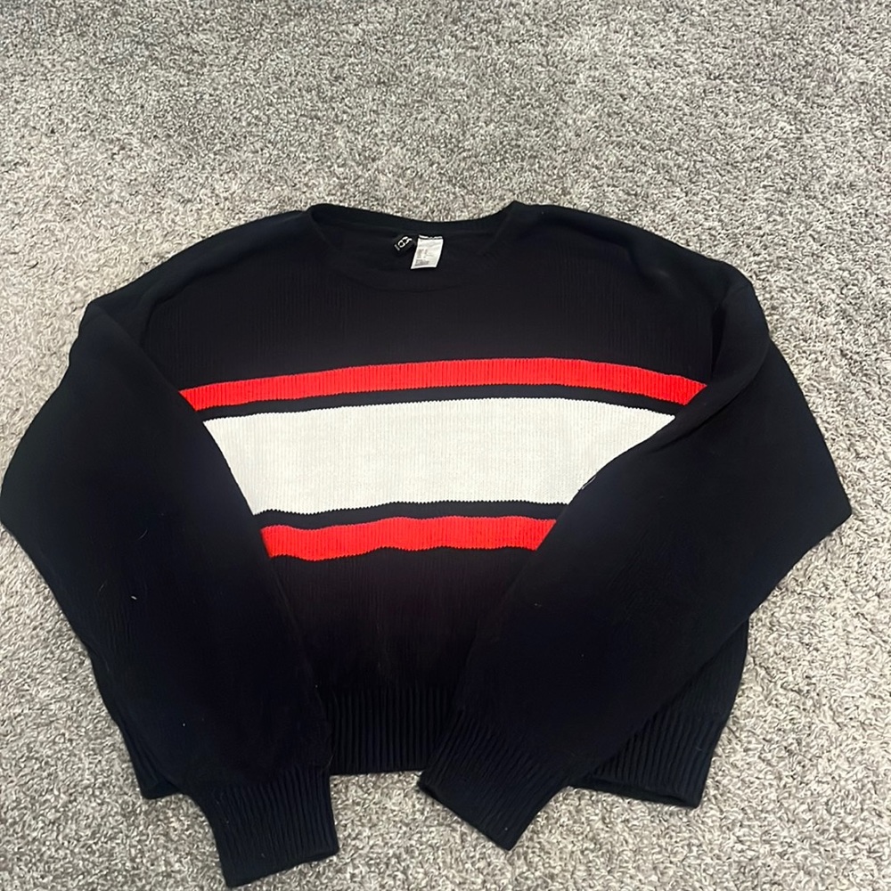 Divided red, white and blue sweater